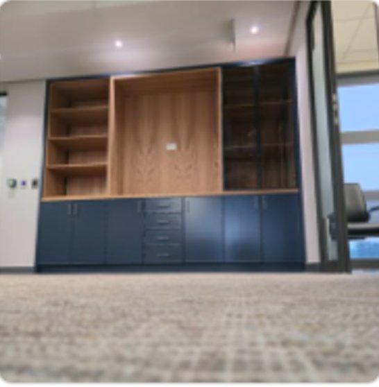 Office fit-out with shelf wall