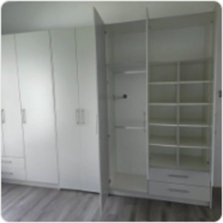 White cupboards and walk-in